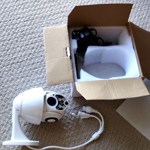 Indoor/ outdoor security camera.IP Camera new in original box.